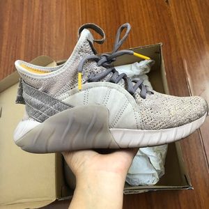 Adidas tubular rise in beige